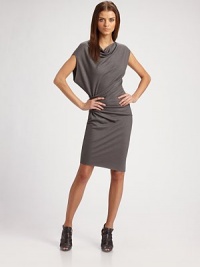 Fluid and fabulous in supple wool jersey, draped at the side for maximum flow.Cowlneck Ruched side Dolman cap sleeves About 28 from natural waist Wool; dry clean Imported Fluid and fabulous in supple wool jersey, draped at the side for maximum flow.Cowlneck Ruched side Dolman cap sleeves About 28 from natural waist Wool; dry clean Imported