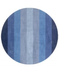 Hand-tufted, blended wool gives an exceptionally soft feel to this rug from the Coastal Treasures collection. In a shimmering, striped design of ocean-blue colorways, this sophisticated piece adds serene character to every decor. Hand-tufted, blended wool gives an exceptionally soft feel to this rug from the Coastal Treasures collection. In a shimmering, striped design of ocean-blue colorways, this sophisticated piece adds serene character to every decor.