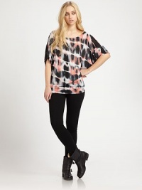 Soft stretch jersey fabric that fits low on the hips is a relaxed, cool look. Wide boatneckDropped shouldersShort dolman sleevesAllover contrasting tie-dyed print90% micro modal/10% silkHand washMade in USAModel shown is 5'9 (176cm) wearing US size XS/S. Soft stretch jersey fabric that fits low on the hips is a relaxed, cool look. Wide boatneckDropped shouldersShort dolman sleevesAllover contrasting tie-dyed print90% micro modal/10% silkHand washMade in USAModel shown is 5'9 (176cm) wearing US size XS/S.