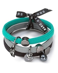 A set of three stylish hair elastics with signature MARC BY MARC JACOBS charms. A set of three stylish hair elastics with signature MARC BY MARC JACOBS charms.