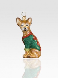 A celebration of Poland's time-honored glassmaking tradition, this charming pup sculpture, dressed in a sparkly argyle sweater, is lovingly crafted by skilled artisans. Mouth-blown Hand-painted Gift boxed 2 high Imported