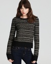 This Juicy Couture sweater shines with a metallic fair-isle print for a luxe approach to layering.