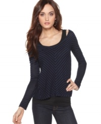 This light-as-air top from Calvin Klein Jeans features flattering stripes and semi-sheer fabric for easy layering. Pair it with skinny jeans and a cami for springtime style with a downtown edge. This light-as-air top from Calvin Klein Jeans features flattering stripes and semi-sheer fabric for easy layering. Pair it with skinny jeans and a cami for springtime style with a downtown edge.