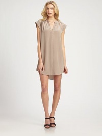 Go safari-chic in this shimmery silk tunic, styled with short roll-tab sleeves and a hi-low hem. V-neckShort roll-tab sleevesHi-low hemAbout 19 from natural waistSilkDry cleanImportedModel shown is 5'10 (177cm) wearing US size Small. Go safari-chic in this shimmery silk tunic, styled with short roll-tab sleeves and a hi-low hem. V-neckShort roll-tab sleevesHi-low hemAbout 19 from natural waistSilkDry cleanImportedModel shown is 5'10 (177cm) wearing US size Small.