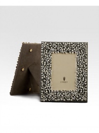 A charming platinum floral motif is laid over a suede background, creating an eye-catching, completely handmade frame fit for any treasured photograph. From the Lorel Collection ImportedDIMENSION INFORMATION4 X 6 (7¼ X 9¼ overall)5 X 7 (8¼ X 10¼ overall)8 X 10 (11¼ X 13¼ overall) A charming platinum floral motif is laid over a suede background, creating an eye-catching, completely handmade frame fit for any treasured photograph. From the Lorel Collection ImportedDIMENSION INFORMATION4 X 6 (7¼ X 9¼ overall)5 X 7 (8¼ X 10¼ overall)8 X 10 (11¼ X 13¼ overall)