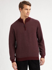 A sporty pullover with a sophisticated mockneck collar in a fine, textured diagonal knit.Ribbed mockneck collarHalf-zip frontLong sleeves with ribbed cuffsRibbed hemMerino woolDry cleanImported A sporty pullover with a sophisticated mockneck collar in a fine, textured diagonal knit.Ribbed mockneck collarHalf-zip frontLong sleeves with ribbed cuffsRibbed hemMerino woolDry cleanImported