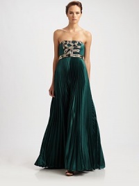 Shimmering embellishments adorn this strapless satin gown with a flowing pleated skirt.Strapless styleBodice embellishmentsPleated skirtConcealed back zipperStole includedFully linedAbout 45 from natural waistPolyesterDry cleanImported Model shown is 5'10 (177cm) wearing US size 4. Shimmering embellishments adorn this strapless satin gown with a flowing pleated skirt.Strapless styleBodice embellishmentsPleated skirtConcealed back zipperStole includedFully linedAbout 45 from natural waistPolyesterDry cleanImported Model shown is 5'10 (177cm) wearing US size 4.