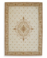 Evoking the opulence of European decor, this rug features an elegant medallion design in shades of gold on a cream background dotted with rosettes. Woven of premium wool for rich texture and indulgent softness. Evoking the opulence of European decor, this rug features an elegant medallion design in shades of gold on a cream background dotted with rosettes. Woven of premium wool for rich texture and indulgent softness.