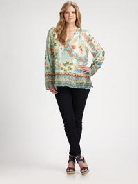 Printed to perfection, this woven silk top features a feminine neckline to draw attention to your decolletage and a relaxed fit, enhanced by side slits. V-neckLong sleevesAllover printPull-on styleSide slitsAbout 31 from shoulder to hemSilkHand washImported Printed to perfection, this woven silk top features a feminine neckline to draw attention to your decolletage and a relaxed fit, enhanced by side slits. V-neckLong sleevesAllover printPull-on styleSide slitsAbout 31 from shoulder to hemSilkHand washImported