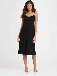 Luxuriously soft jersey gown is a little bit of paradise, with a subtly sexy fit. Adjustable spaghetti straps. 40 long Modal/polyester; machine wash Imported Luxuriously soft jersey gown is a little bit of paradise, with a subtly sexy fit. Adjustable spaghetti straps. 40 long Modal/polyester; machine wash Imported