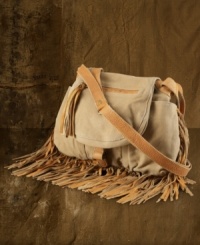 Swingy suede fringe immediately elevates a scaled-down canvas messenger bag from rugged basic to haute must-have essential, from Denim & Supply Ralph Lauren. Swingy suede fringe immediately elevates a scaled-down canvas messenger bag from rugged basic to haute must-have essential, from Denim & Supply Ralph Lauren.