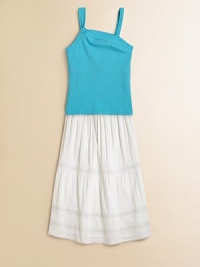 Fashion for her gets edgy with an asymmetrical neckline and knot detail on one shoulder strap.Asymmetrical necklineSleevelessPullover style95% cotton/5% spandexMachine washImported Fashion for her gets edgy with an asymmetrical neckline and knot detail on one shoulder strap.Asymmetrical necklineSleevelessPullover style95% cotton/5% spandexMachine washImported