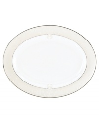 Refine your formal table with classic cream and white Lenox dinnerware. Dishes, including this Opal Innocence Scroll bone china oval platter, are trimmed in platinum and accented with a raised dot and scroll pattern, bringing contemporary grace to special occasions. A pearlized finish adds subtle shimmer. Refine your formal table with classic cream and white Lenox dinnerware. Dishes, including this Opal Innocence Scroll bone china oval platter, are trimmed in platinum and accented with a raised dot and scroll pattern, bringing contemporary grace to special occasions. A pearlized finish adds subtle shimmer.