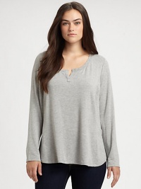 Inspired by athletic style, but with a decidedly feminine shape, a jersey top with intriguing seams. It will pair exquisitely with skinny jeans.Split neckLong sleevesPull-on styleCurved hemAbout 26 from shoulder to hemModal/spandexMachine washMade in USA Inspired by athletic style, but with a decidedly feminine shape, a jersey top with intriguing seams. It will pair exquisitely with skinny jeans.Split neckLong sleevesPull-on styleCurved hemAbout 26 from shoulder to hemModal/spandexMachine washMade in USA