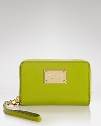 MICHAEL Michael Kors gives the on-the-go girl exactly what she needs (and wants): a stylish and sleek spot to stow her PDA. MICHAEL Michael Kors gives the on-the-go girl exactly what she needs (and wants): a stylish and sleek spot to stow her PDA.