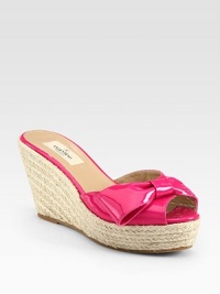 A pretty bow rests atop this patent leather go-to essential, with textured rope edging. Covered wedge, 3½ (90mm)Covered platform, 1¼ (30mm)Compares to a 2¼ heel (60mm)Patent leather upperLeather liningRubber solePadded insoleMade in Italy A pretty bow rests atop this patent leather go-to essential, with textured rope edging. Covered wedge, 3½ (90mm)Covered platform, 1¼ (30mm)Compares to a 2¼ heel (60mm)Patent leather upperLeather liningRubber solePadded insoleMade in Italy