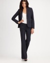 Tailored in lightweight stretch wool with a flattering flared leg. Wide waistband with belt loops Front zipper with hook-and-eye Side pockets Back besom pockets Inseam, about 33 Wool/lycra; dry clean Made in USA