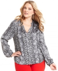 Unlock an enchanting look with MICHAEL Michael Kors' snakeskin-print plus size blouse, accented by a chain neckline. Unlock an enchanting look with MICHAEL Michael Kors' snakeskin-print plus size blouse, accented by a chain neckline.