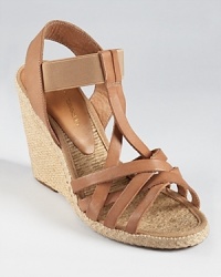 In goes-with-everything taupe, Andre Assous' Fanny espadrilles qualify as a classic in a timeless wedge silhouette. In goes-with-everything taupe, Andre Assous' Fanny espadrilles qualify as a classic in a timeless wedge silhouette.