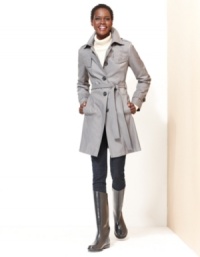 You'll hope for blustery days with DKNY's trench coat. The quilted construction adds a unique touch to this classic silhouette. You'll hope for blustery days with DKNY's trench coat. The quilted construction adds a unique touch to this classic silhouette.