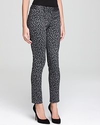 Unleash your exotic side with these leopard-print DKNYC pants. Finish the style with a razor-sharp blazer and spark some serious fashion envy. Unleash your exotic side with these leopard-print DKNYC pants. Finish the style with a razor-sharp blazer and spark some serious fashion envy.