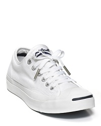 These classic shoes made famous by Jack Purcell are as popular as ever. Canvas low-top sneakers with stripe detail at toe.