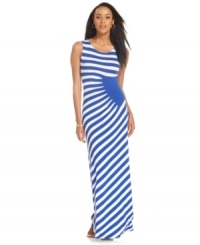ECI adds an intriguing twist to this summery maxi--a solid, seamed panel at the waist swaps the direction of stripes for a kick of contrast at the bodice and skirt. ECI adds an intriguing twist to this summery maxi--a solid, seamed panel at the waist swaps the direction of stripes for a kick of contrast at the bodice and skirt.