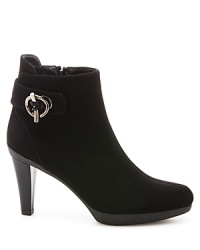 Ring in the style: Bold, metal, ring-shaped details punctuate streamlined uppers in these simply chic Stuart Weitzman platform booties. Ring in the style: Bold, metal, ring-shaped details punctuate streamlined uppers in these simply chic Stuart Weitzman platform booties.