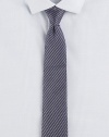 Trim stripes, pared in width to balance the cut of modern suits and jackets.SilkDry cleanMade in USA