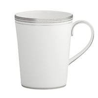 World-renowned fashion designer Monique Lhuillier collaborated with Waterford to create this fine bone china dinnerware collection. Drawing inspiration from the artful details that finish Lhuillier's brilliant couture bridal gowns, each piece in the assortment is decorated with polished platinum accents in a raised stitching design. World-renowned fashion designer Monique Lhuillier collaborated with Waterford to create this fine bone china dinnerware collection. Drawing inspiration from the artful details that finish Lhuillier's brilliant couture bridal gowns, each piece in the assortment is decorated with polished platinum accents in a raised stitching design.
