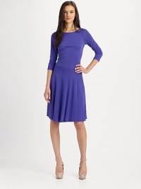 Soft T-shirt jersey ties at the back and flares at the hem for a chic, feminine fit.BoatneckThree-quarter sleevesSet-in waistBack cut-outsAbout 23 from natural waistViscoseDry cleanImported Soft T-shirt jersey ties at the back and flares at the hem for a chic, feminine fit.BoatneckThree-quarter sleevesSet-in waistBack cut-outsAbout 23 from natural waistViscoseDry cleanImported
