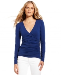 A flattering ruched top from MICHAEL Michael Kors gets a hint of modern edge with an exposed zipper at one side. A classic silhouette with a modern twist, it adds flair to your favorite denim essentials. A flattering ruched top from MICHAEL Michael Kors gets a hint of modern edge with an exposed zipper at one side. A classic silhouette with a modern twist, it adds flair to your favorite denim essentials.