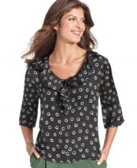 This petite top from Elementz features a grownup take on the polka dot print and a charming ruffled neckline. This petite top from Elementz features a grownup take on the polka dot print and a charming ruffled neckline.
