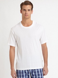 Versatile tee can stand alone or be worn as an undershirt, shaped in soft cotton, in a casual, roomy fit for all day comfort.CrewneckCottonMachine washImported Versatile tee can stand alone or be worn as an undershirt, shaped in soft cotton, in a casual, roomy fit for all day comfort.CrewneckCottonMachine washImported