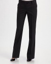 A sharply tailored style in a lightweight wool blend, with a beautiful drape and clean straight leg.Front tab button and zip closure with interior button tab Belt loops Flat front Side slash pockets Back seams Back button welt pocket Inseam, about 35 97% virgin wool/3% other fibers Dry clean Made in Italy