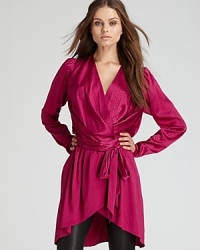 Sleek snake print is emboldened by a rich, vibrant hue in this sumptuous silk Rachel Zoe tunic. Sleek snake print is emboldened by a rich, vibrant hue in this sumptuous silk Rachel Zoe tunic.