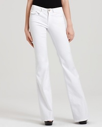 These Rachel Zoe flare-leg jeans prove white isn't just for summer and '70s-inspired style is having a moment. Work the look to the hilt: a silk tie-neck blouse and towering platforms should complete with retro cool. These Rachel Zoe flare-leg jeans prove white isn't just for summer and '70s-inspired style is having a moment. Work the look to the hilt: a silk tie-neck blouse and towering platforms should complete with retro cool.