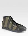 A top-grade sneaker crafted in Italy from superior, striped leather.Leather upperLeather liningRubber soleMade in Italy