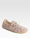 Stretchy canvas go-to in a darling floral print with a lace-up front and rubber sole. Printed cotton canvas upperRubber solePadded insoleMade in ItalyOUR FIT MODEL RECOMMENDS ordering true whole size; ½ sizes should order the next whole size up.