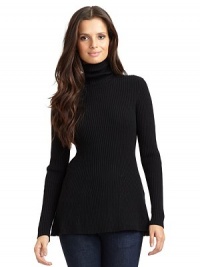 THE LOOKAllover ribbed knit constructionTurtleneckTrapeze hemTHE FITAbout 27 from shoulder to hemTHE MATERIALCashmereCARE & ORIGINHand washImportedModel shown is 5'9 (175cm) wearing US size Small. THE LOOKAllover ribbed knit constructionTurtleneckTrapeze hemTHE FITAbout 27 from shoulder to hemTHE MATERIALCashmereCARE & ORIGINHand washImportedModel shown is 5'9 (175cm) wearing US size Small.