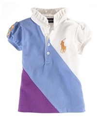 A hint of stretch, a colorful pieced design and Big Pony embroidery give a modern look and feel to a short-sleeved cotton mesh rugby shirt. A hint of stretch, a colorful pieced design and Big Pony embroidery give a modern look and feel to a short-sleeved cotton mesh rugby shirt.