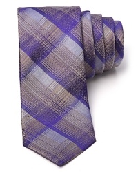 HUGO furnishes this skinny silk tie with an artful brushstroke check for an innovative take on classic plaid. HUGO furnishes this skinny silk tie with an artful brushstroke check for an innovative take on classic plaid.