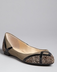 Mixed media flats in boldly graphic detail define these Enzo Angiolini flats. On-trend pointed toes are accented by geometric patent details against exotic printed calf hair. Mixed media flats in boldly graphic detail define these Enzo Angiolini flats. On-trend pointed toes are accented by geometric patent details against exotic printed calf hair.