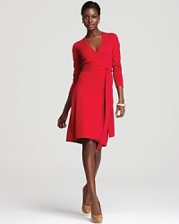DIANE von FURSTENBERG's signature wrap dress gets a menswear-inspired sweater-knit construction and so-now red-hot color. DIANE von FURSTENBERG's signature wrap dress gets a menswear-inspired sweater-knit construction and so-now red-hot color.