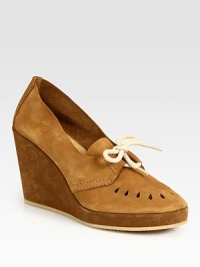 Perforated leather and suede classic with a lace-up front. Self-covered wedge, 4 (100mm)Self-covered platform, 1 (25mm)Compares to a 3 heel (75mm)Leather and suede upperLeather liningRubber solePadded insoleMade in FranceOUR FIT MODEL RECOMMENDS ordering true whole size; ½ sizes should order the next whole size up. Perforated leather and suede classic with a lace-up front. Self-covered wedge, 4 (100mm)Self-covered platform, 1 (25mm)Compares to a 3 heel (75mm)Leather and suede upperLeather liningRubber solePadded insoleMade in FranceOUR FIT MODEL RECOMMENDS ordering true whole size; ½ sizes should order the next whole size up.