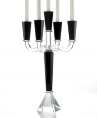 Towering over a room in bold, dramatic fashion, the Sussex candelabra is all you need to redefine the dining table. Five arms of alternating black and clear crystal with sleek, faceted detail require no candlelight to make a magnificent statement. From Lighting by Design. Towering over a room in bold, dramatic fashion, the Sussex candelabra is all you need to redefine the dining table. Five arms of alternating black and clear crystal with sleek, faceted detail require no candlelight to make a magnificent statement. From Lighting by Design.