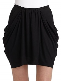 THE LOOKNarrow wasitband with center elasticDraped side pocketsEmbroidered mythical mask embellishment at side hipBack zipper with hook-and-eye closureTHE FITAbout 17 from shoulder to hemTHE MATERIAL67% modal/33% acetateCARE & ORIGINHand wash or dry cleanImportedModel shown is 5'10 (177cm) wearing US size Small. THE LOOKNarrow wasitband with center elasticDraped side pocketsEmbroidered mythical mask embellishment at side hipBack zipper with hook-and-eye closureTHE FITAbout 17 from shoulder to hemTHE MATERIAL67% modal/33% acetateCARE & ORIGINHand wash or dry cleanImportedModel shown is 5'10 (177cm) wearing US size Small.