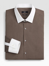 Not your basic solid dress shirt, this tailored classic of crisp, slim-fitting cotton, is accented with contrasting collar and cuff for a modern update.Button-frontPoint collarCottonMachine washImported Not your basic solid dress shirt, this tailored classic of crisp, slim-fitting cotton, is accented with contrasting collar and cuff for a modern update.Button-frontPoint collarCottonMachine washImported