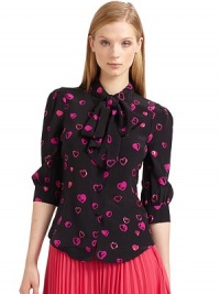 THE LOOKHeart print with sequin detailsShirt collarRemovable tie-neck collar with button closureFront button closureThree-quarter length gathered button cuff sleeves Pleated shoulders Back yoke with gathered detailsTHE FITAbout 22 from shoulder to hemTHE MATERIALSilkCARE & ORIGINDry cleanImportedModel shown is 5'10 (177cm) wearing US size 4. THE LOOKHeart print with sequin detailsShirt collarRemovable tie-neck collar with button closureFront button closureThree-quarter length gathered button cuff sleeves Pleated shoulders Back yoke with gathered detailsTHE FITAbout 22 from shoulder to hemTHE MATERIALSilkCARE & ORIGINDry cleanImportedModel shown is 5'10 (177cm) wearing US size 4.