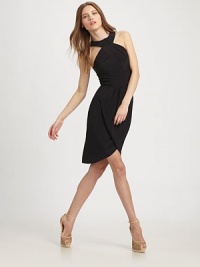 EXCLUSIVELY AT SAKS. EXCLUSIVELY AT SAKS.